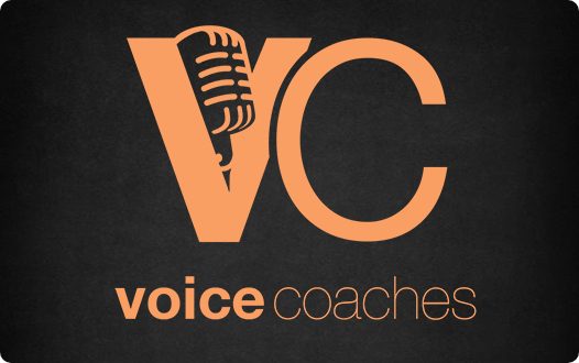 Voice Coaches logo - "VC" in bubble letters with a microphone resting in the space in the V on top, "voice coaches" in text on the bottom